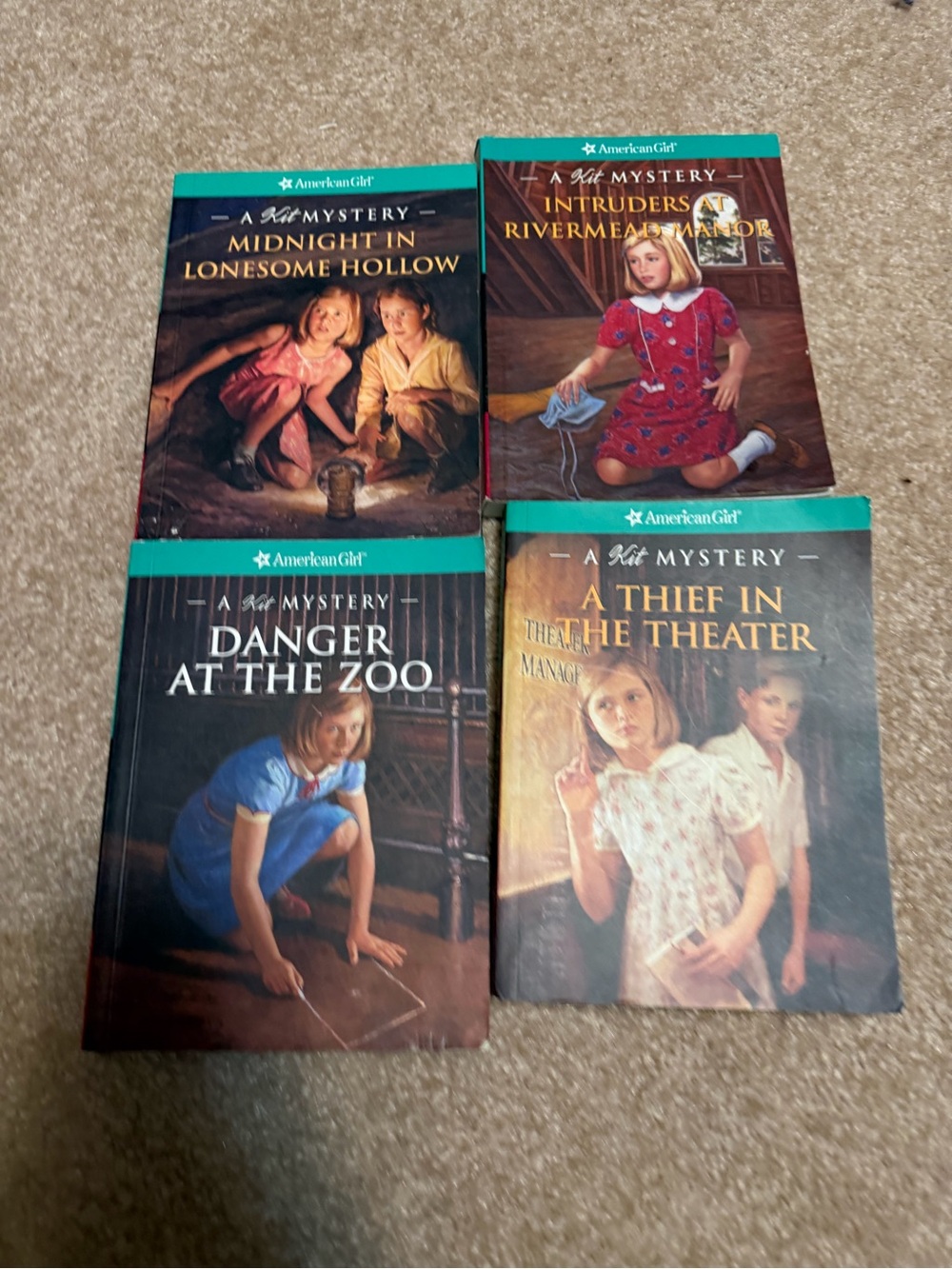 Lot of 4 American Girl paperbacks from the Kit Mystery series